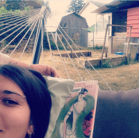 Yurt Sitting. Reading a library book in a hammock. Life is hard.
